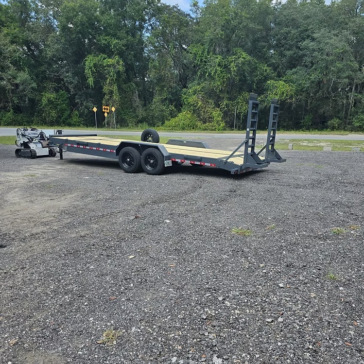 24 foot equipment trailer rental in Altoona FL - Bigfoot Trailers with wood deck